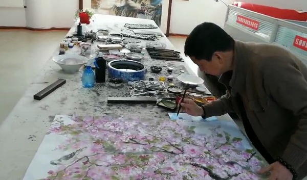 经明老师作画.jpg